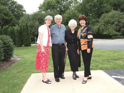 Rev. & Mrs. Harold Johnson, who were Wesleyan missionaries in early days, with their two daughters.